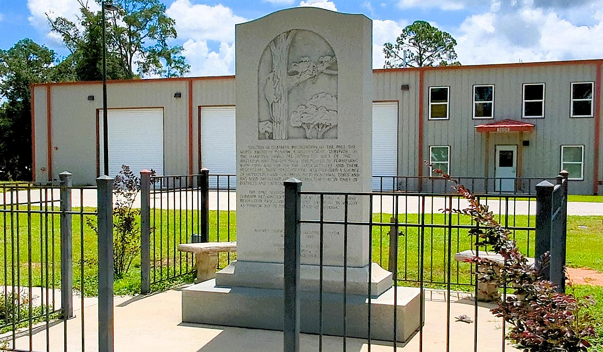 the possum monument that stands in the center of Wausau, Florida